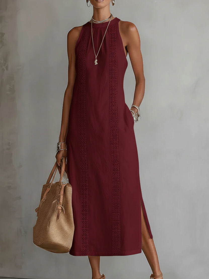 Woman wearing a relaxed embroidered mandarin collar midi dress, perfect for an elegant casual summer look.