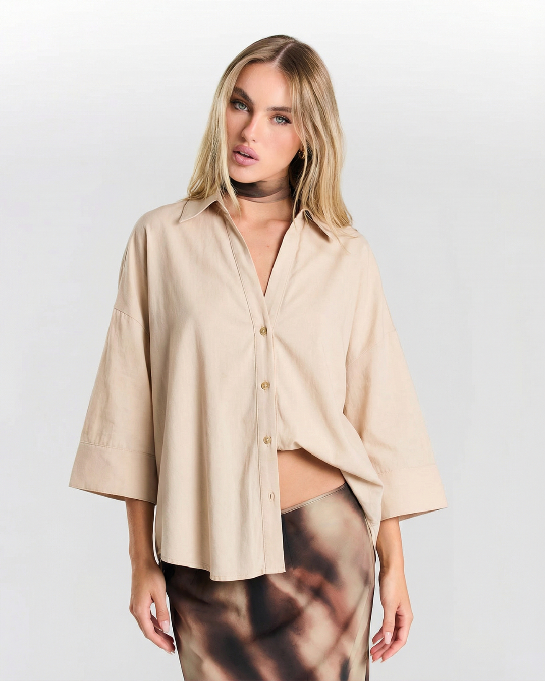 Women's relaxed oversized button shirt in a casual chic style, perfect for everyday wear.