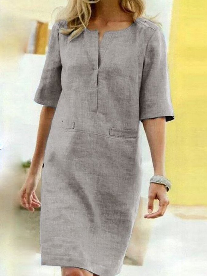 Comfortable women's shift dress with pockets, effortless relaxed fit for versatile everyday wear.