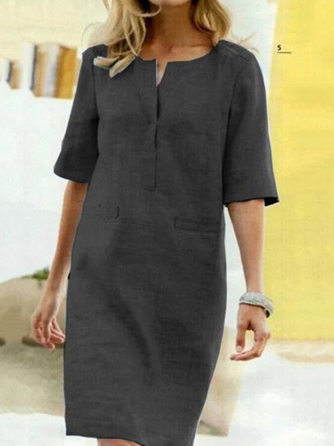 Effortless women's relaxed shift dress. Comfortable, versatile, and stylish for any casual occasion.
