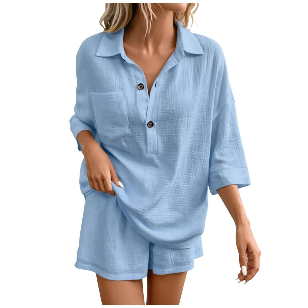 Comfortable women's summer set with a relaxed fit shirt & shorts, ideal for casual outings and warm weather.