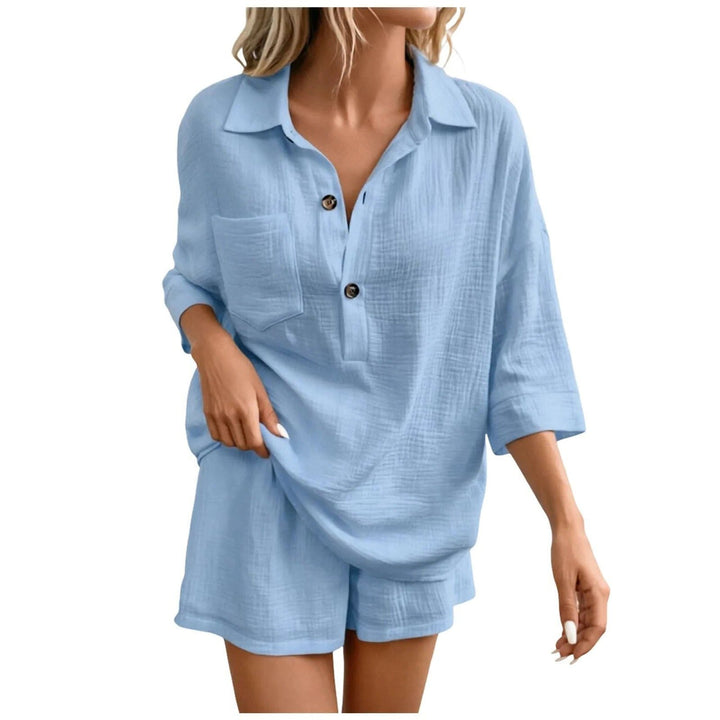 Comfortable women's summer set with a relaxed fit shirt & shorts, ideal for casual outings and warm weather.