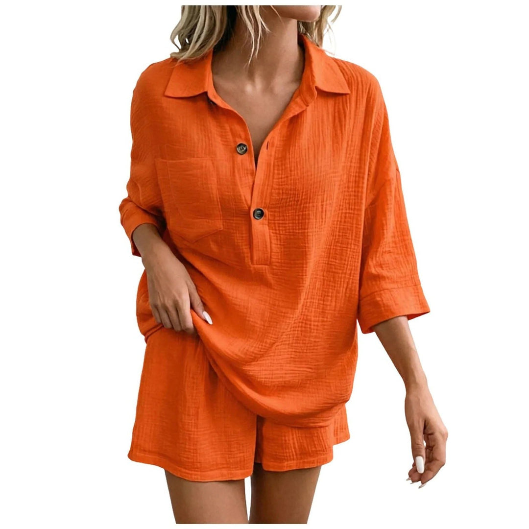 Women's relaxed fit summer outfit, including a stylish button-down shirt & comfortable shorts, perfect for holidays.