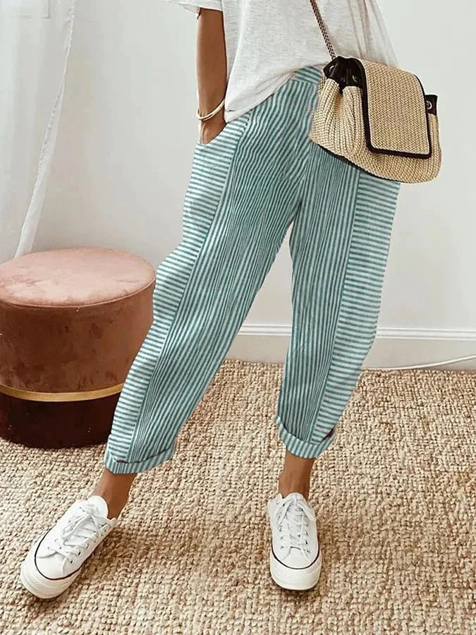 Effortless striped summer pants for women. Relaxed fit, elastic waist, & tapered leg for chic casual style.