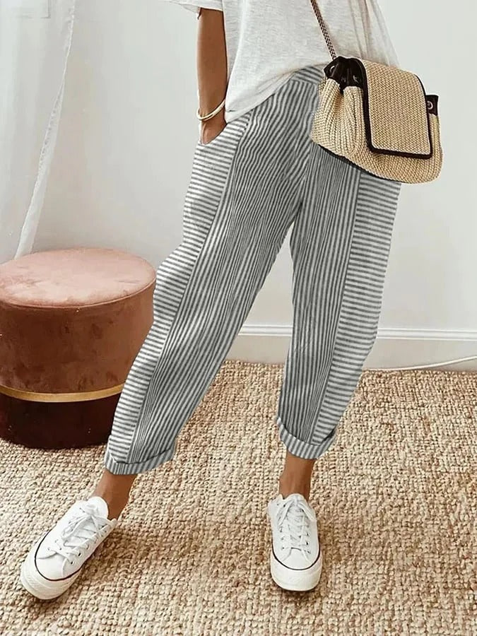 Women's effortless relaxed striped pants. Elastic waist & tapered leg trousers for comfortable summer wear.