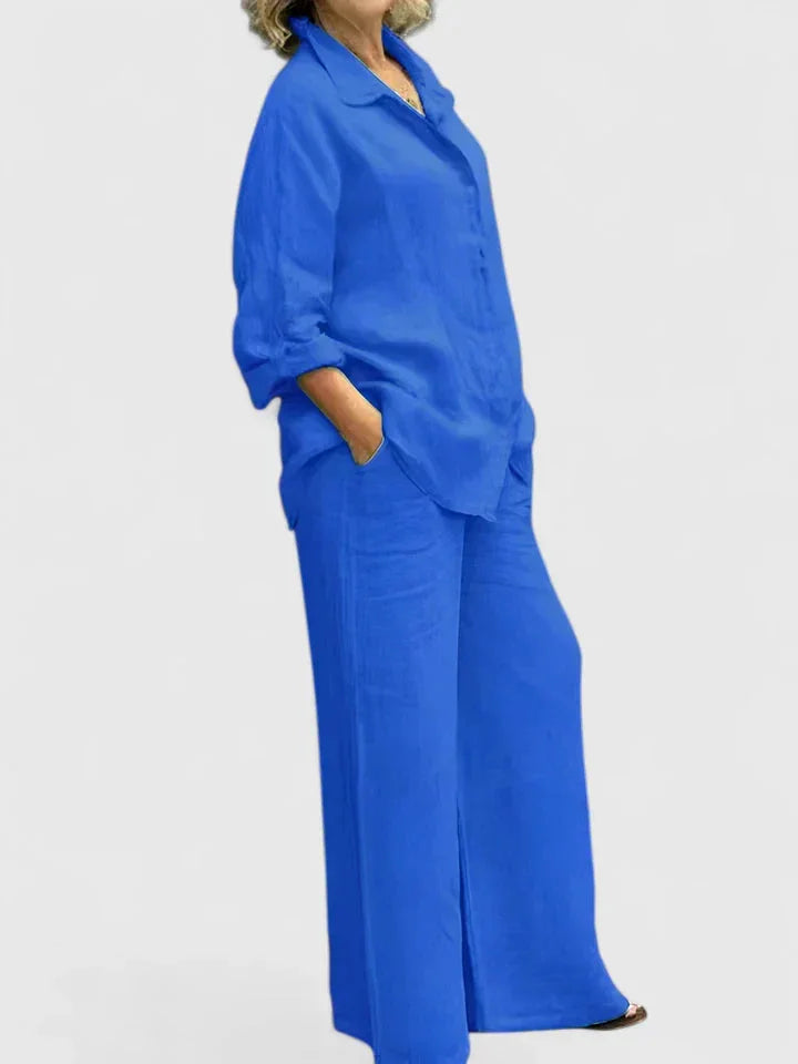 Women's comfortable & stylish two-piece set: a relaxed button-down top and wide leg trousers.
