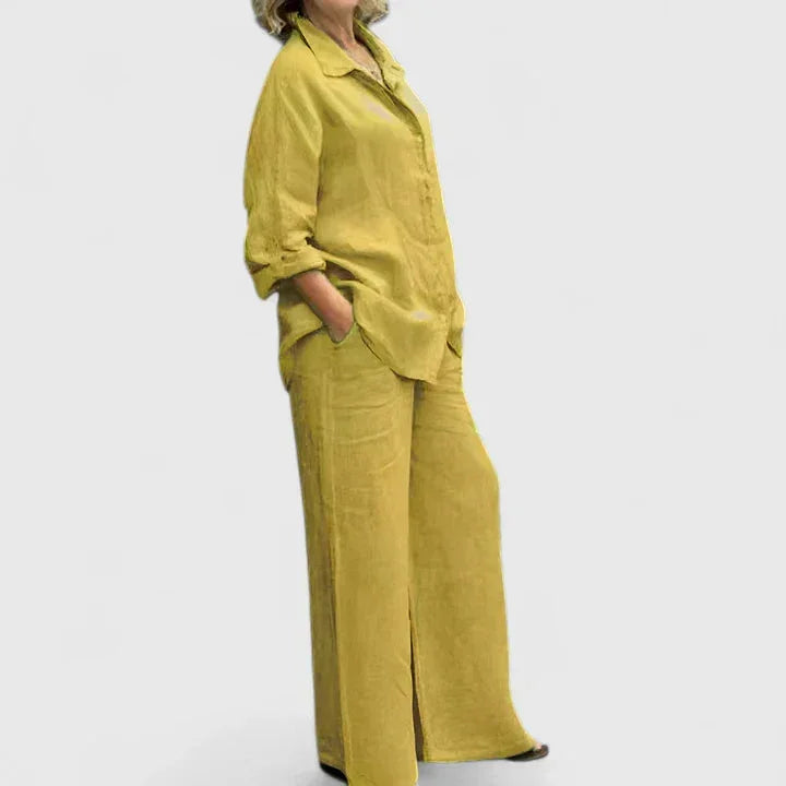 Women's casual fashion set: relaxed button-down shirt and comfortable wide leg pants. Two piece style.