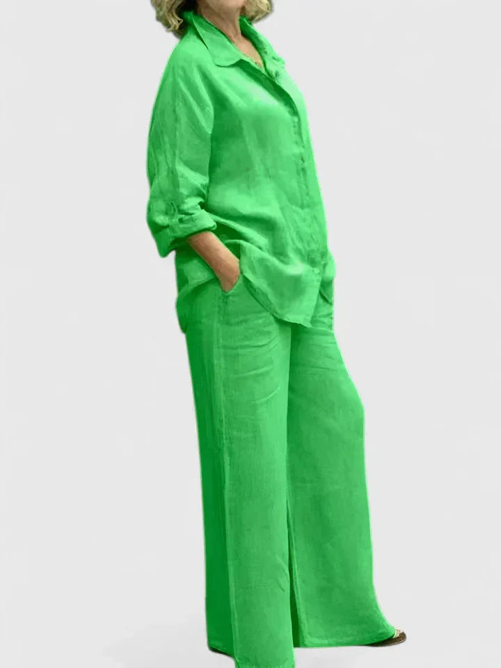 Trendy women's two-piece set featuring a relaxed button-down shirt and wide leg pants for any occasion.