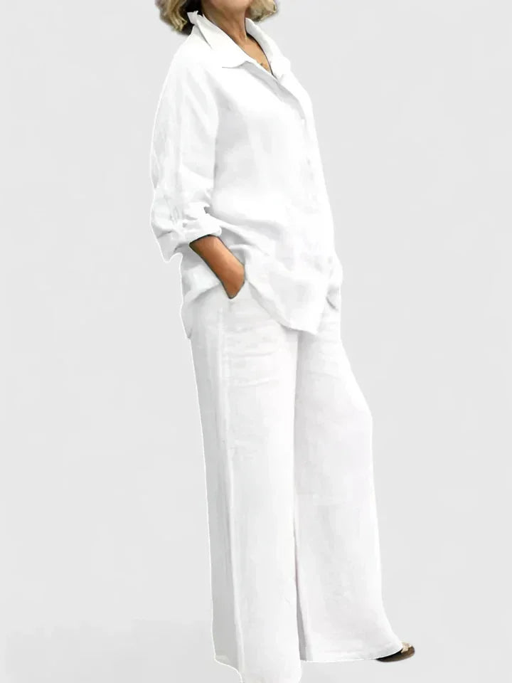 Comfortable women's two-piece casual set with a relaxed button-down top and wide leg pants.