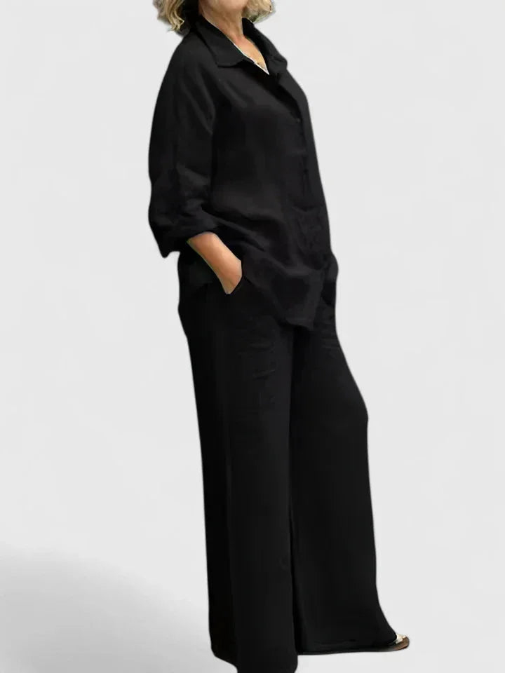 Women's relaxed fit button-down shirt and matching wide leg pants set for effortless spring style.