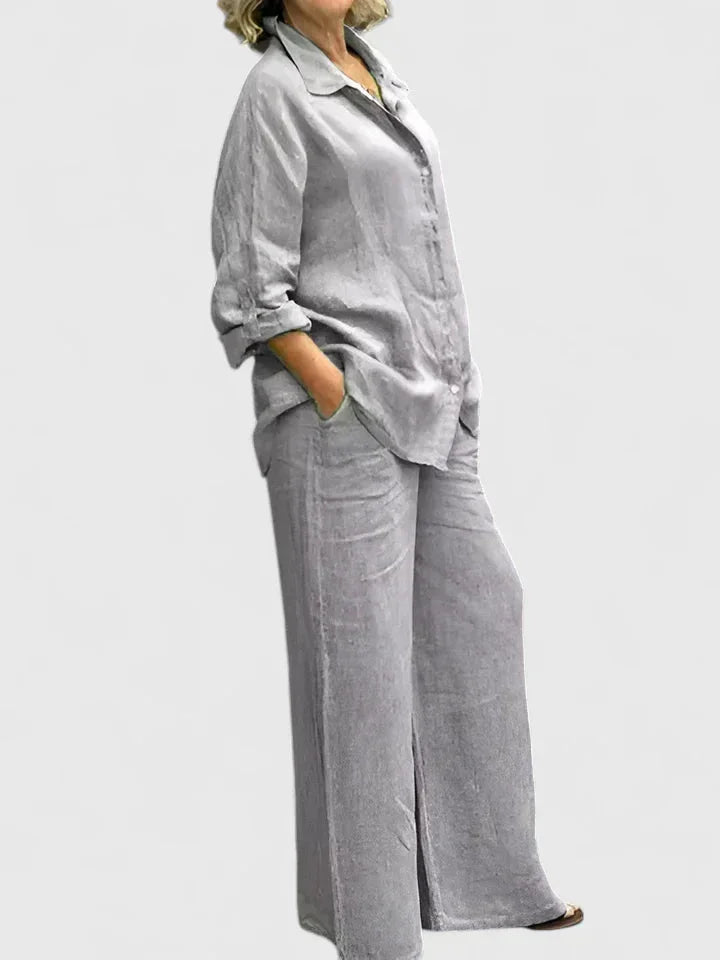Lightweight women's two-piece outfit with a breezy button-down shirt & flowing wide leg pants.