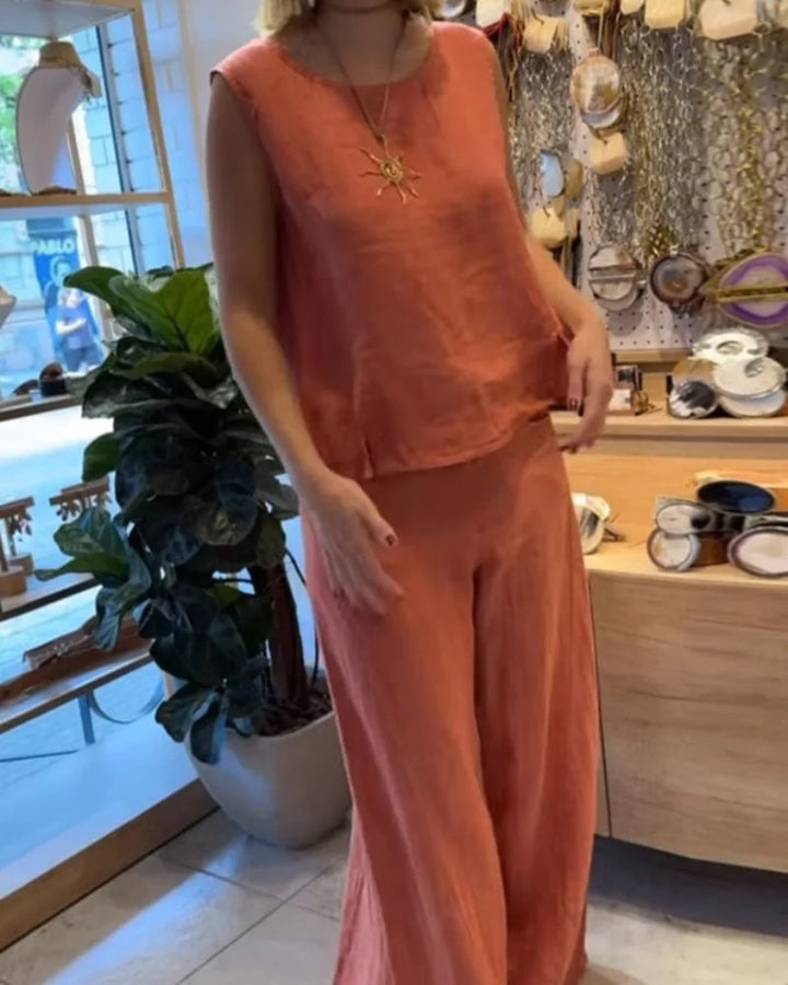 Chic women's coordinated set: sleeveless top & wide-leg pants, perfect for resort or vacation style.