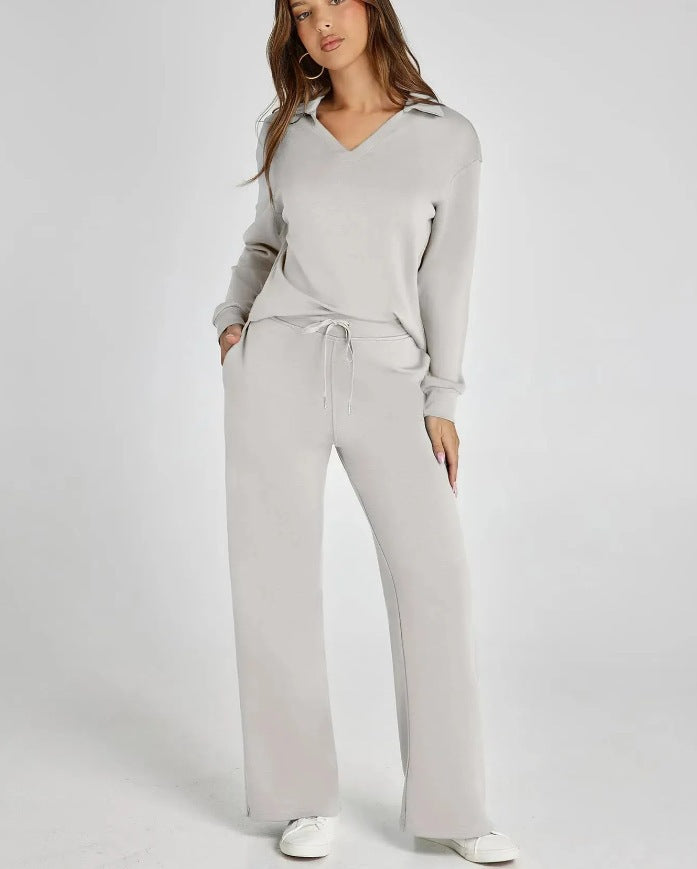 Close-up of a women's relaxed V-neck long-sleeve top from a comfort lounge set. Soft, casual wear for everyday.