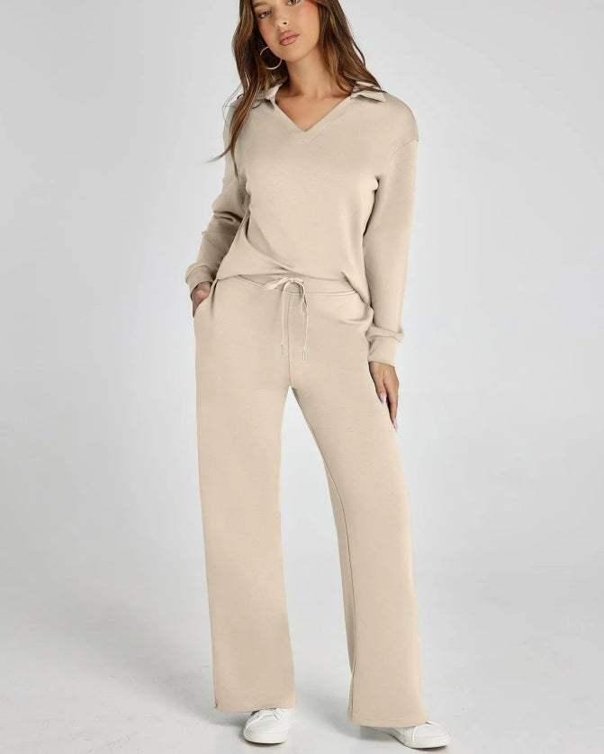 Woman wearing a relaxed comfort V-neck top and wide leg pants lounge set. Perfect for casual wear, sleep or travel.
