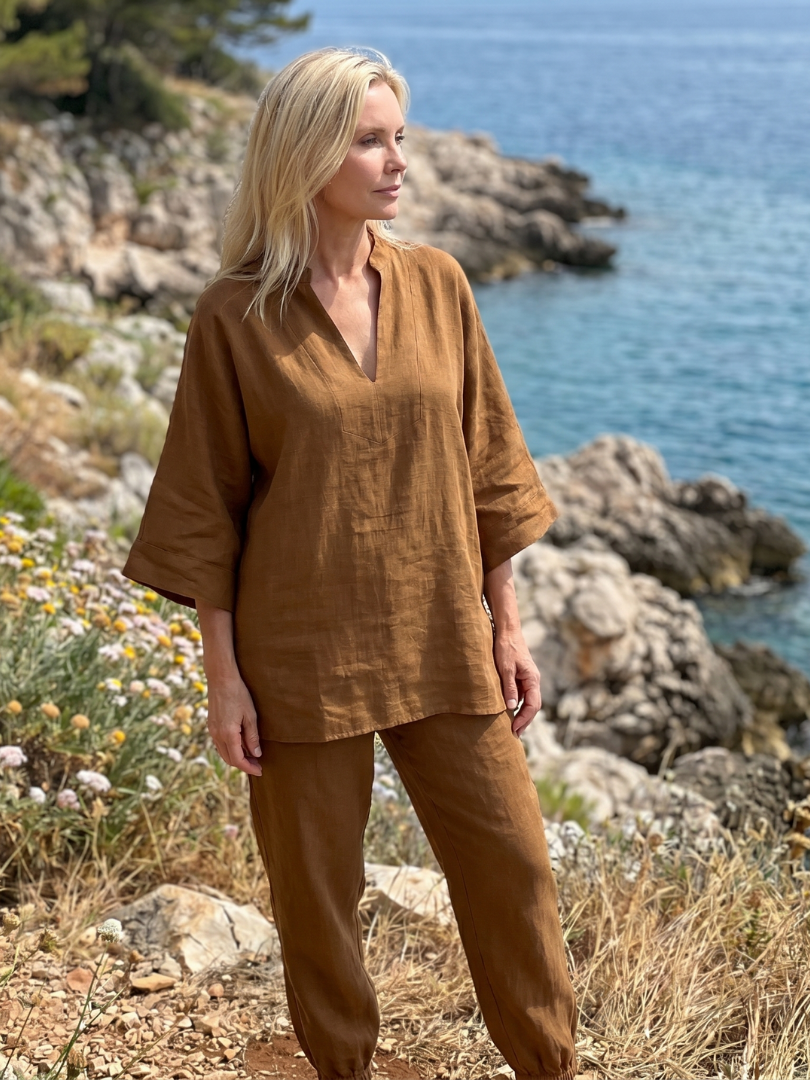 Modern women's relaxed V-neck tunic & gathered trouser set. Chic two-piece for casual wear.