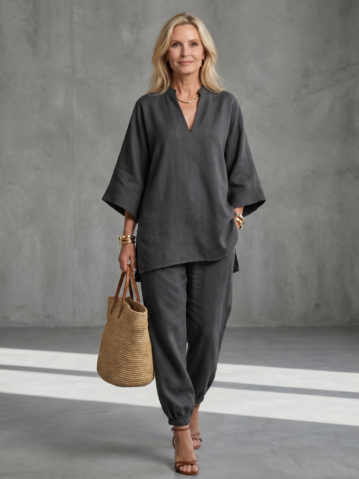 Simple elegance in this women's relaxed V-neck tunic & gathered trouser set. Great for summer.