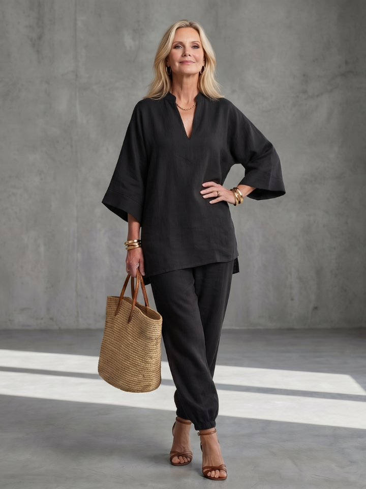 Comfy & chic women's two-piece set. Relaxed V-neck tunic and gathered trousers for fashion.