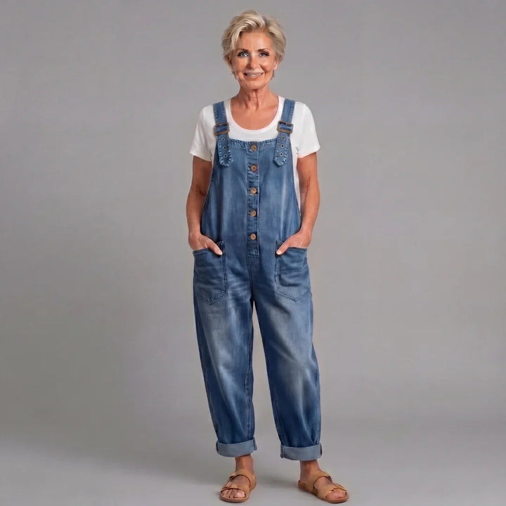 Woman in relaxed wide leg bib overalls & button front. Comfortable everyday casual wear for spring & summer.
