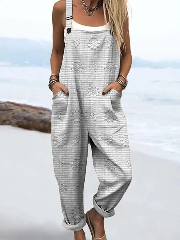 Easy-wear women's relaxed wide-leg jumpsuit, offering ultimate comfort with its loose fit and functional pockets.