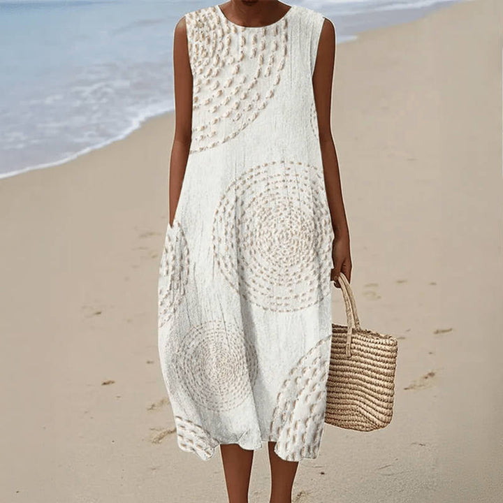 Women's retro casual midi dress with a round neck, sleeveless design, and practical pockets, perfect for spring/summer.
