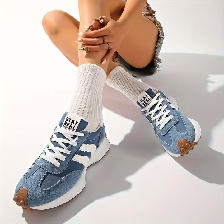 Women's everyday comfort retro trainers. Lace-up casual sneakers offering supportive and stylish footwear.