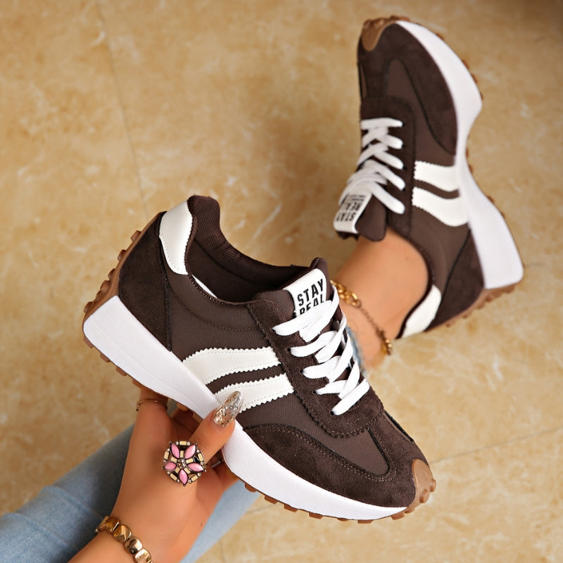 Front view of women's retro casual lace-up trainers. Fashion sneakers designed for everyday comfort & style.