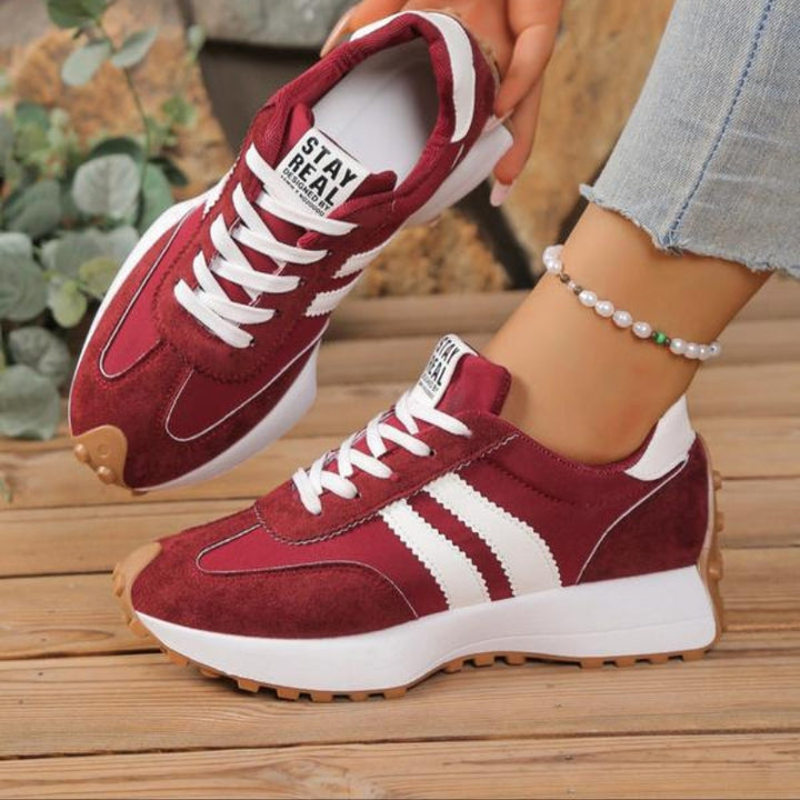 Back view of women's retro casual trainers. Supportive everyday walking shoes offering style and comfort.