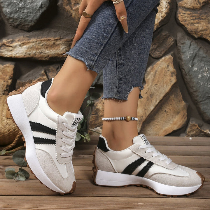 Women's stylish retro trainers for casual outings. Comfortable lace-up fashion sneakers, perfect for daily wear.