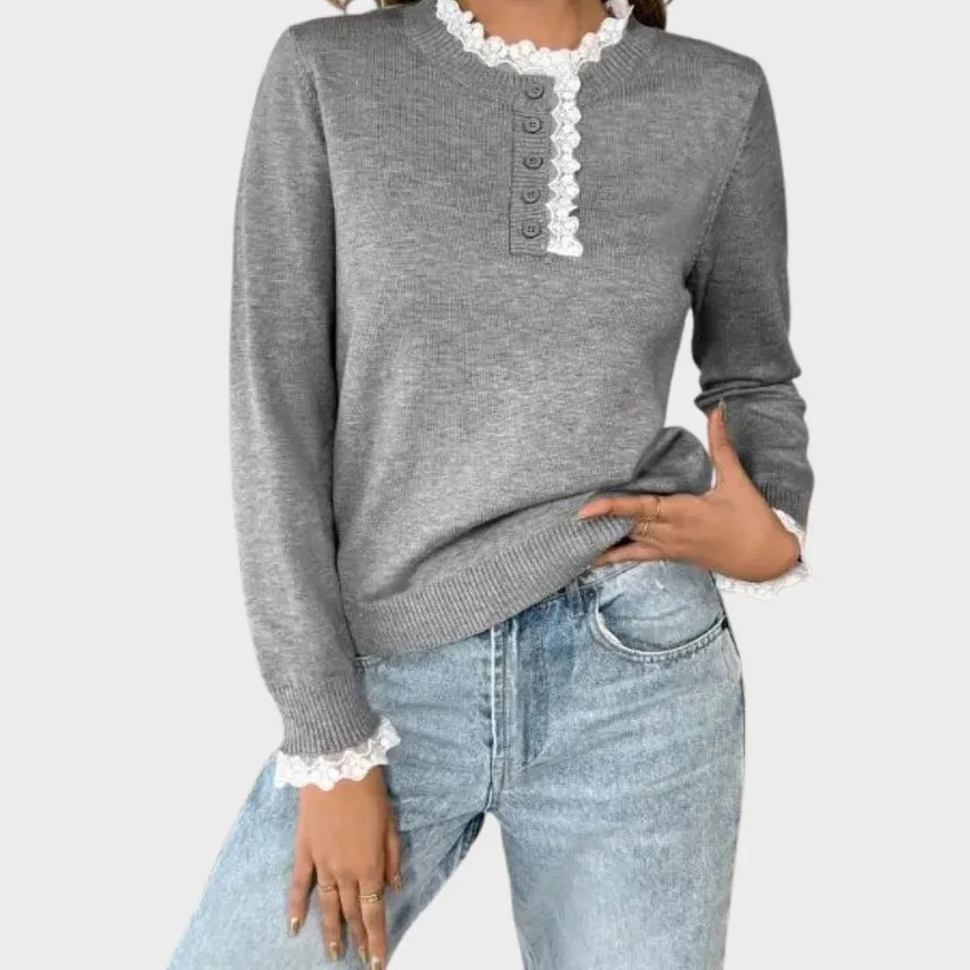 Cozy women's grey knit long-sleeve sweater featuring a vintage-style lace mock-neck. Ideal for winter chic.