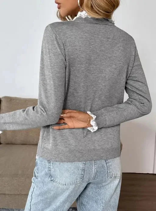 Classic women's long-sleeve grey henley knit sweater with a sophisticated lace mock-neck for fall.