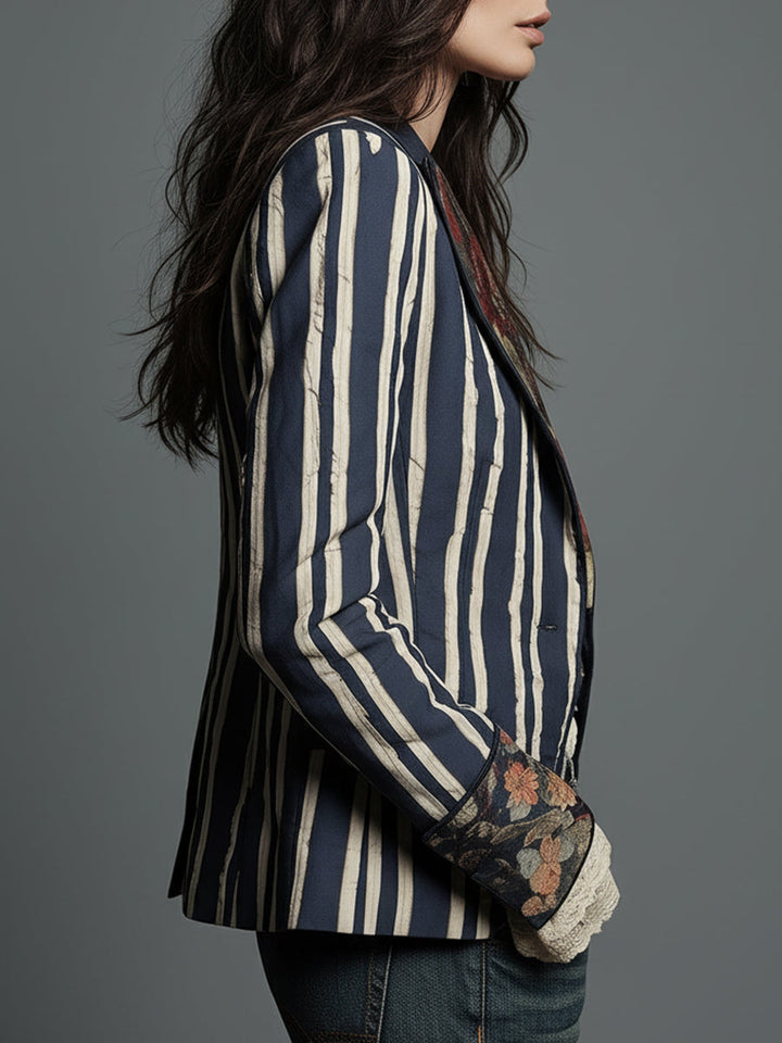 Elegant women's striped blazer, a retro statement piece of outerwear for sophisticated style.