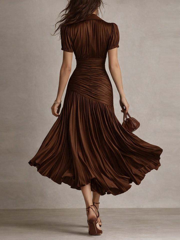 Back view of a women's elegant retro striped short sleeve midi dress, showcasing its versatile silhouette.