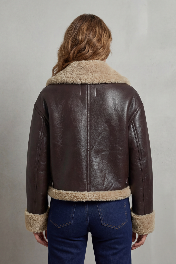 Chic women's aviator jacket, cropped and reversible, ideal for stylish winter outfits.