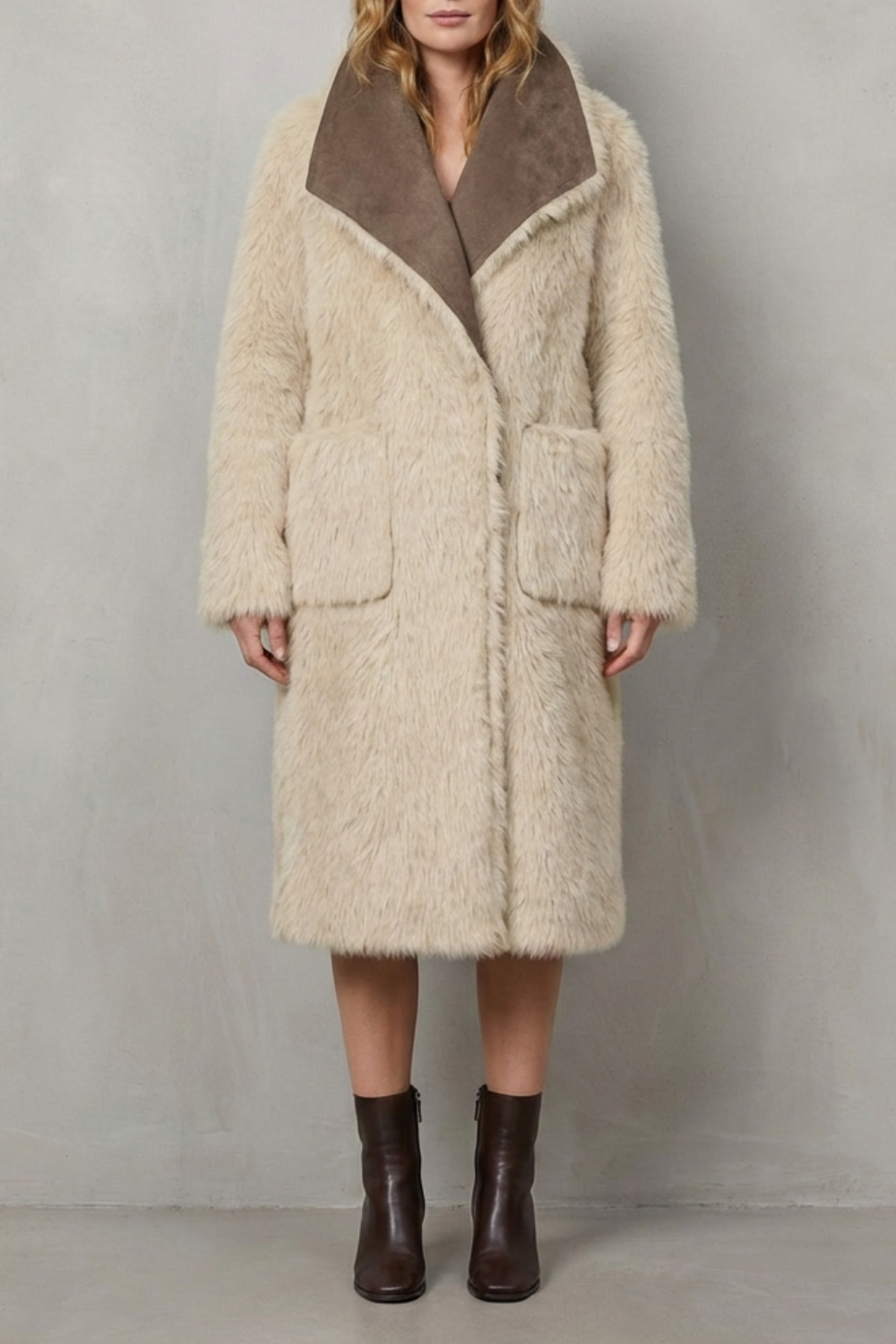Full view of a women's reversible textured winter coat, highlighting its warmth, versatility, and stylish design.