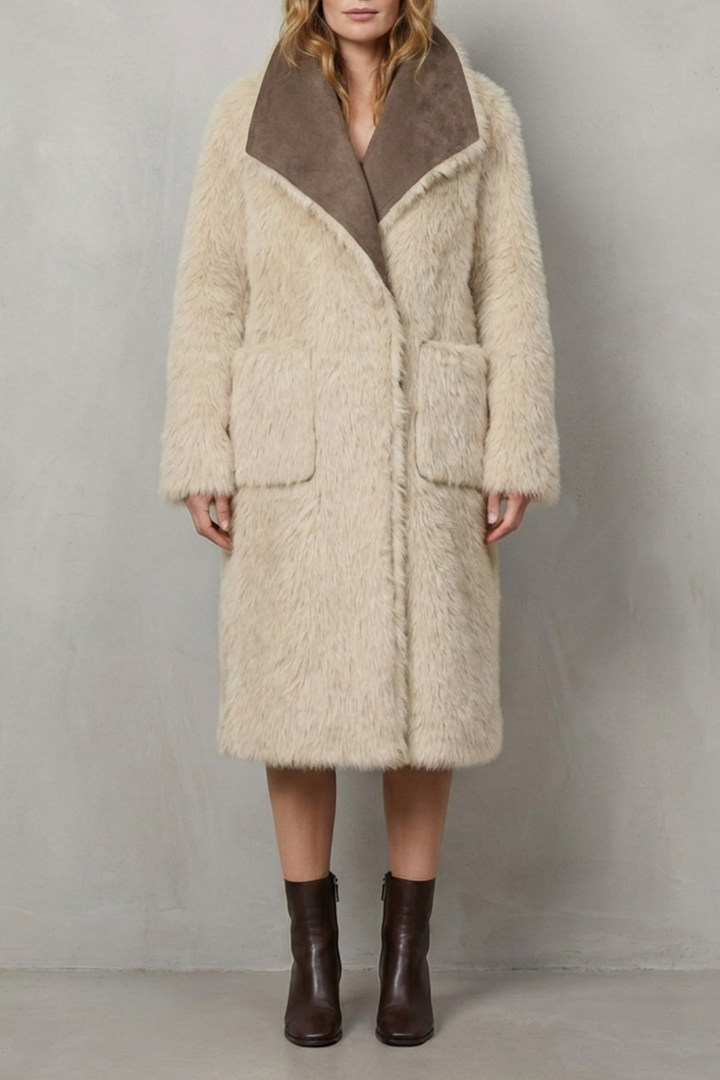 Full view of a women's reversible textured winter coat, highlighting its warmth, versatility, and stylish design.