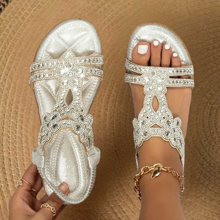 Women's slingback flat sandals with rhinestones, ideal for summer vacations and casual elegance.