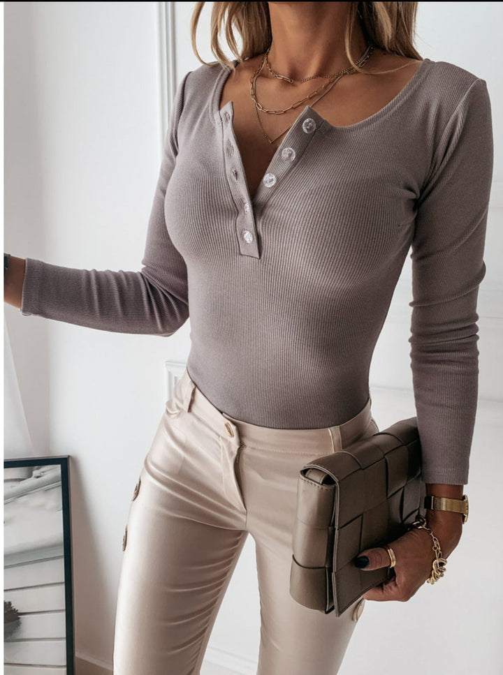 Women's ribbed Henley long sleeve top in a casual style, perfect for spring and fall fashion.