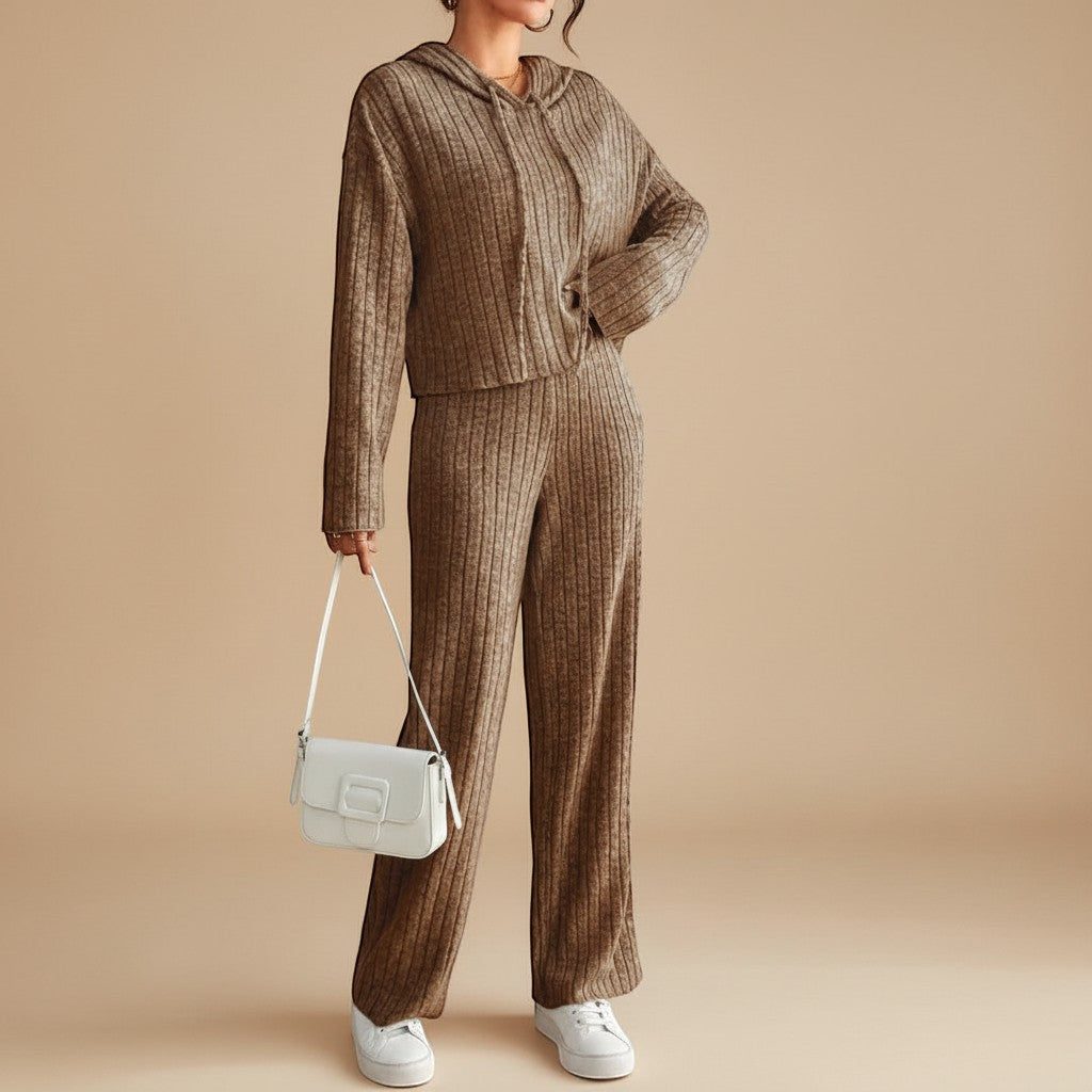 Cozy women's loungewear set featuring a ribbed hoodie and relaxed fit pants. Perfect for comfort & casual wear.