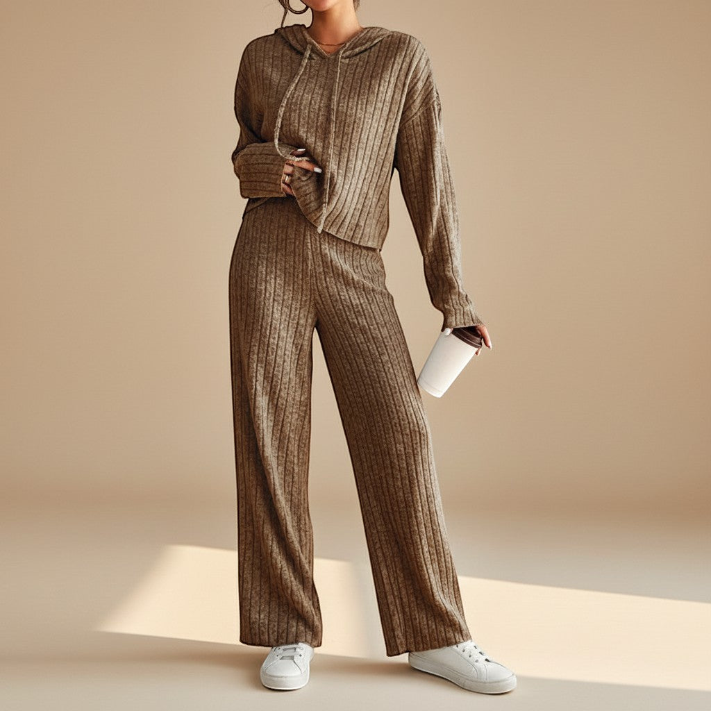 Comfortable women's ribbed hoodie and relaxed pants set. Versatile loungewear perfect for stylish at-home wear.