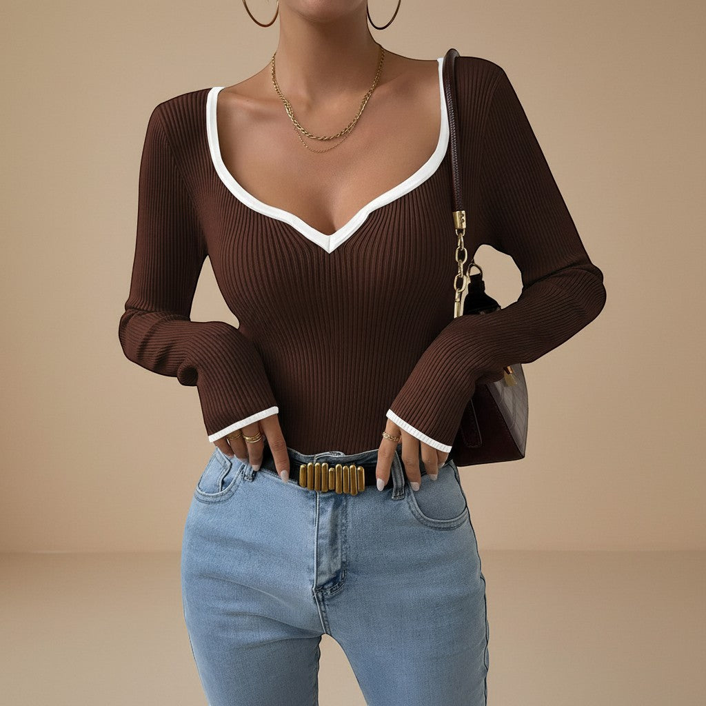Women's ribbed top, long sleeve, elegant V-neck, contrast trim. A versatile casual staple.