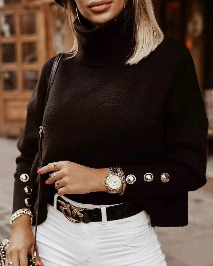 Soft ribbed women's turtleneck sweater, long sleeve with functional buttons. Cozy and chic fall/winter apparel.