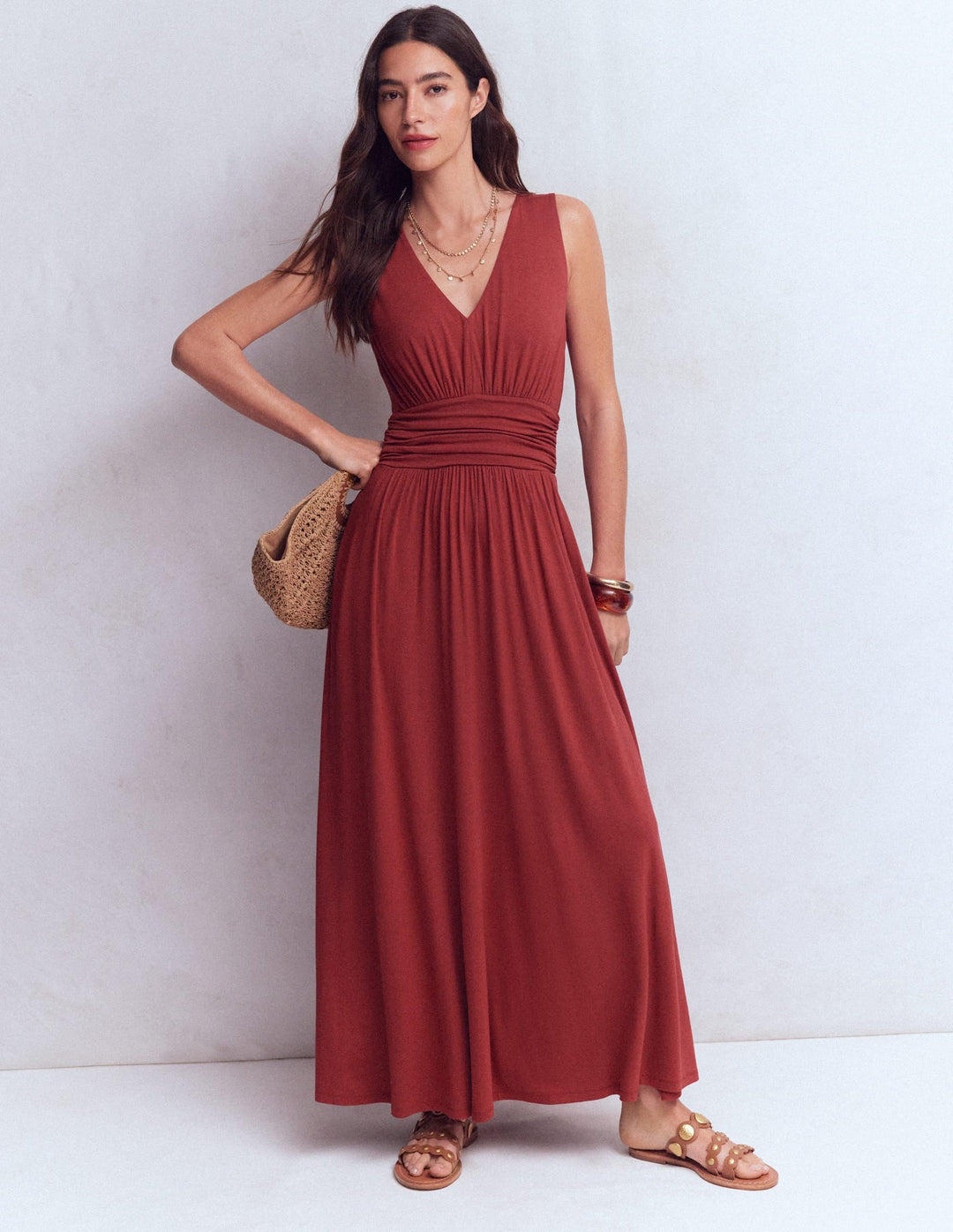 Rich chestnut V-neck babydoll maxi dress, elegantly draped with a relaxed, comfortable fit.