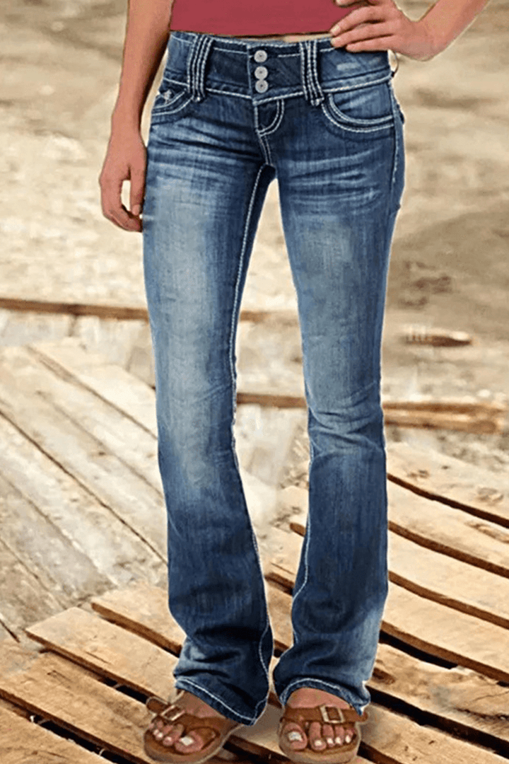 Trendy women's high-waisted bootcut jeans with fashionable rips, versatile for modern everyday outfits.