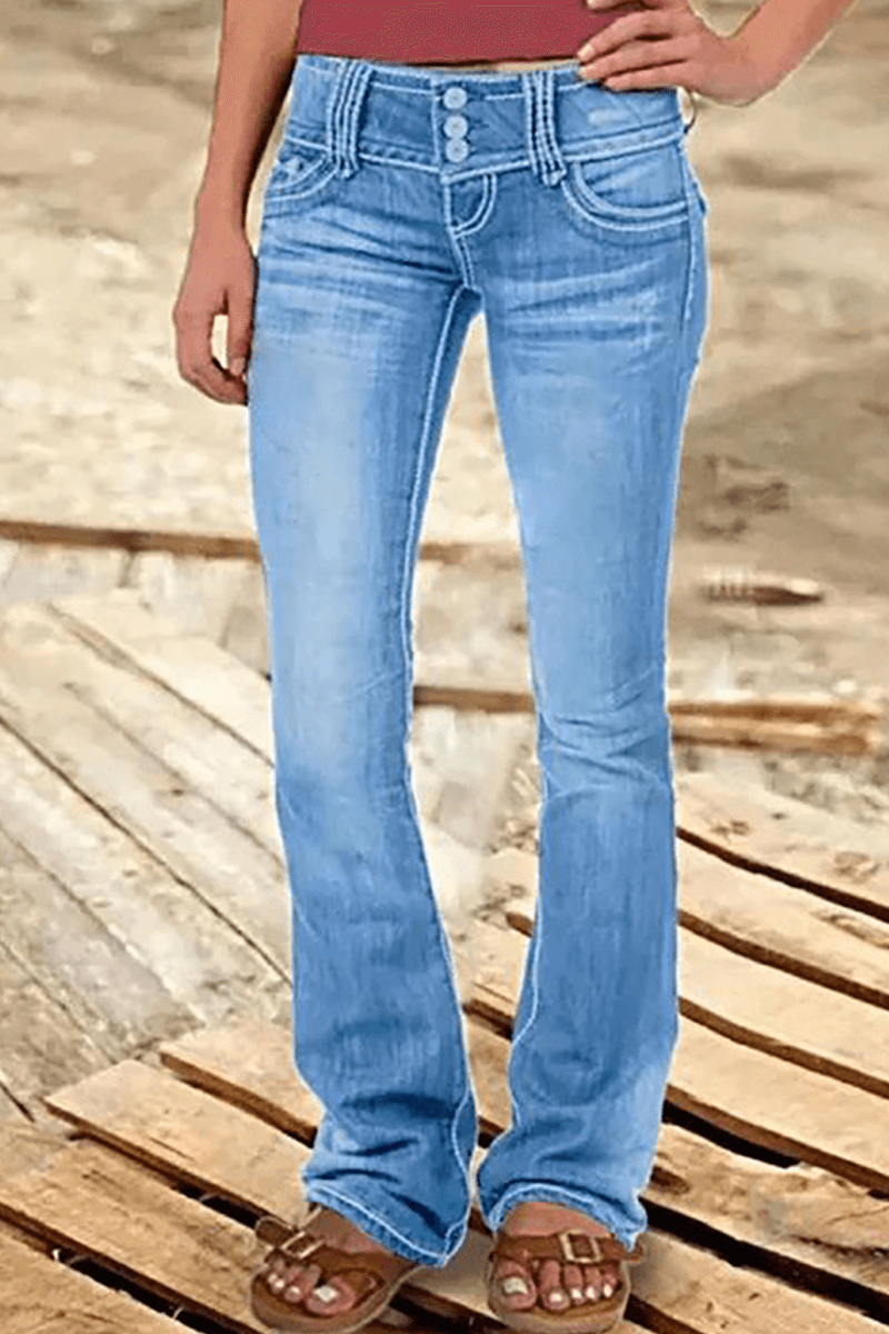 Distressed women's high-waisted bootcut jeans with stylish rips, perfect for a modern casual look.