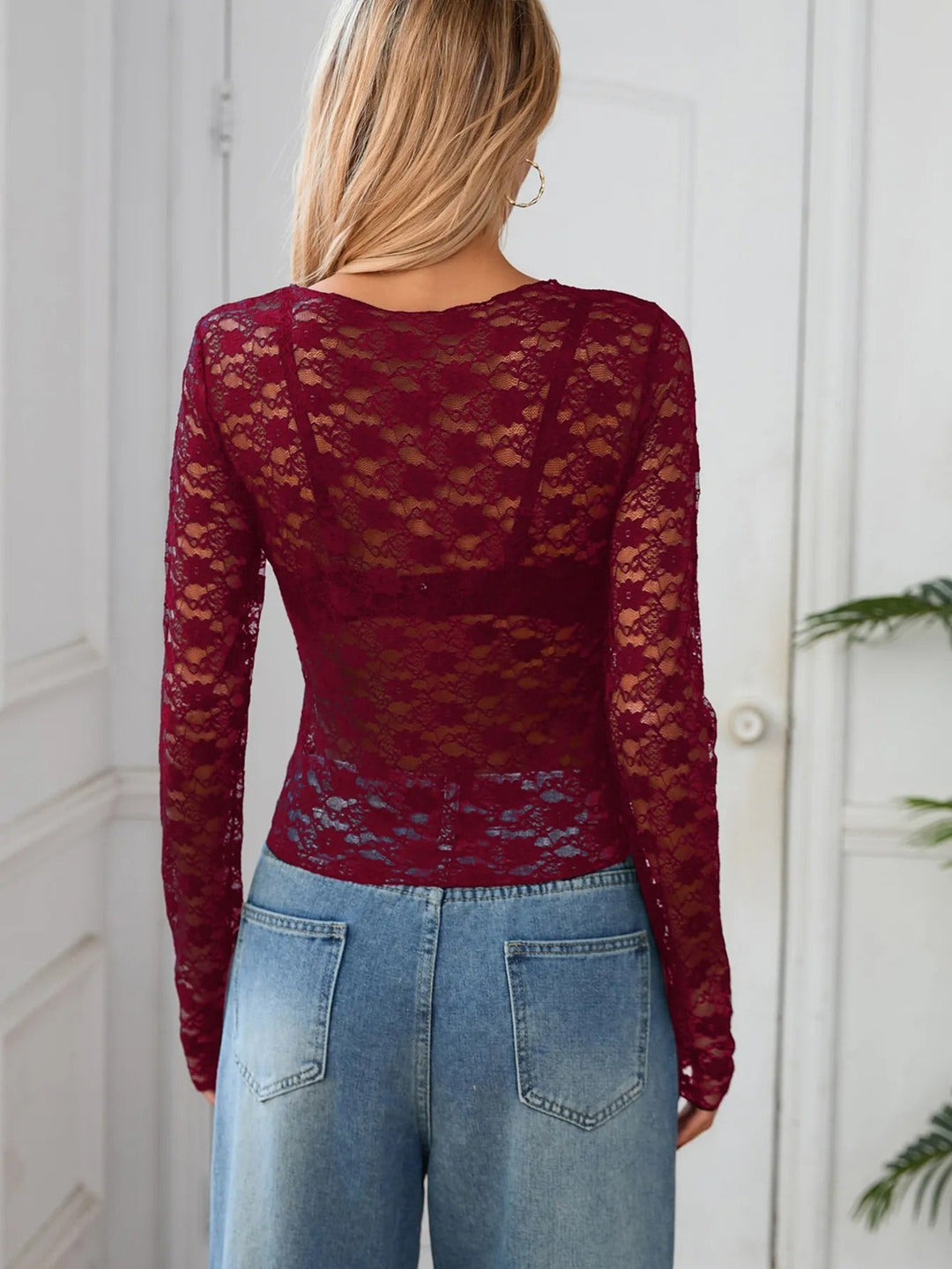 Women's sheer long sleeve top, black. Romantic & elegant evening wear for a sophisticated date night look.