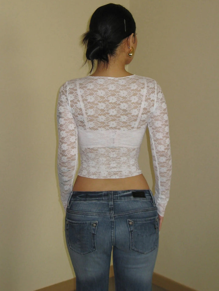 Women's romantic sheer long sleeve top. A sophisticated layering piece, ideal for evening wear & date nights.