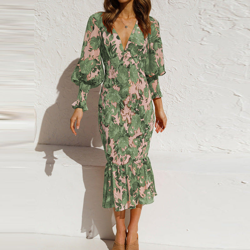 Casual yet chic women's floral smocked midi dress, ideal for summer evenings.