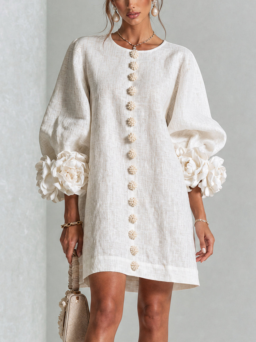 Women's round neck long sleeve button-down mini shift dress.