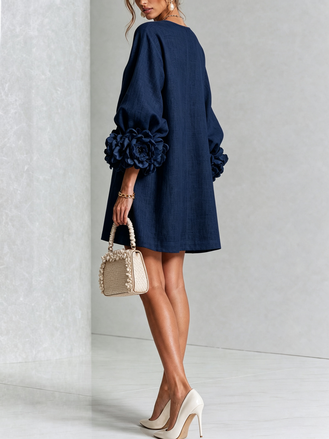 Summer-ready long sleeve button-down mini dress, great for warm days.