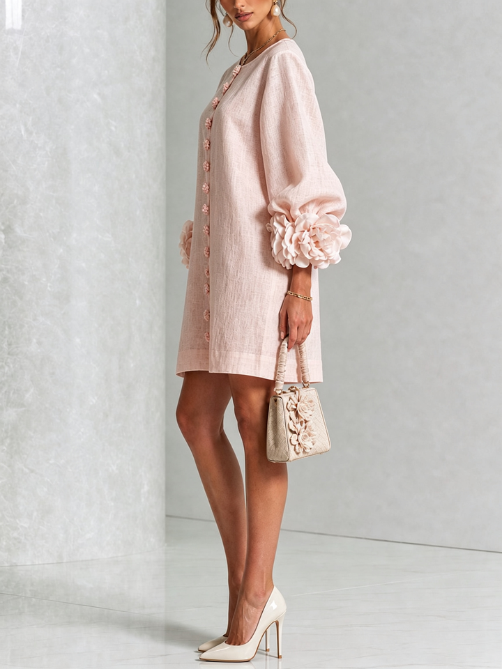 Comfortable button-down long sleeve shift dress, an everyday essential.